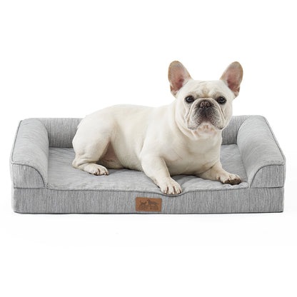 Dog lying on a gray pet bed with a white background#color_Grey