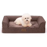 Cozy Kiss All Seasons U-shaped scratch-resistant dog bed in grey, front view with a dog resting on it