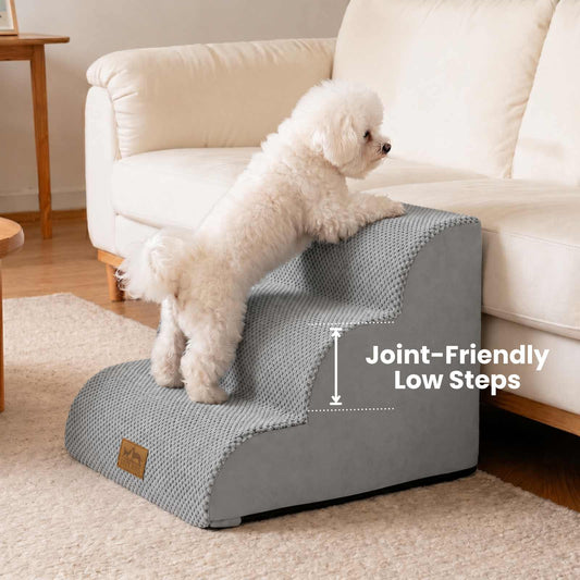 Side lifestyle view of Cozy Kiss 3-Step Gentle Slope Curved Pet Stairs featuring low-rise steps designed to reduce joint strain for small dogs #color_Gray