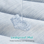 Cozy Kiss leakproof mat protecting a couch from liquid leakage 