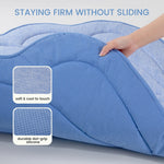 Blue  shell shape cooling mat for pets with hand demonstrating firmness, text 'Staying Firm Without Sliding', and close-ups of texture and grip.
